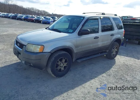 2004 Ford Escape Xlt z USA, uszkodzony, nr VIN 1FMCU03164KA96034